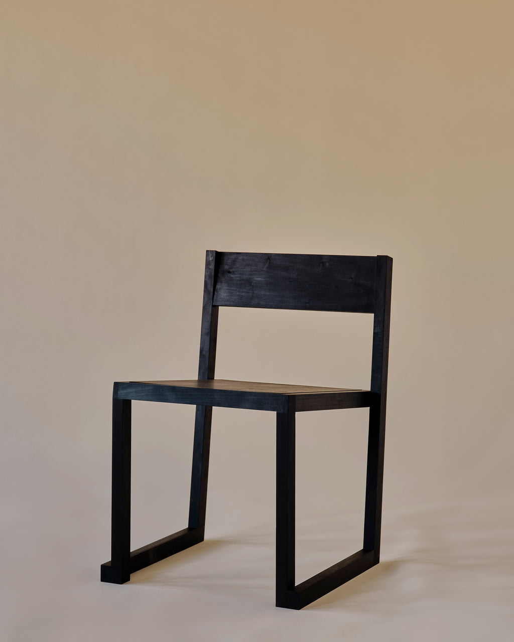 Stacking Chair Ebonized Side 1