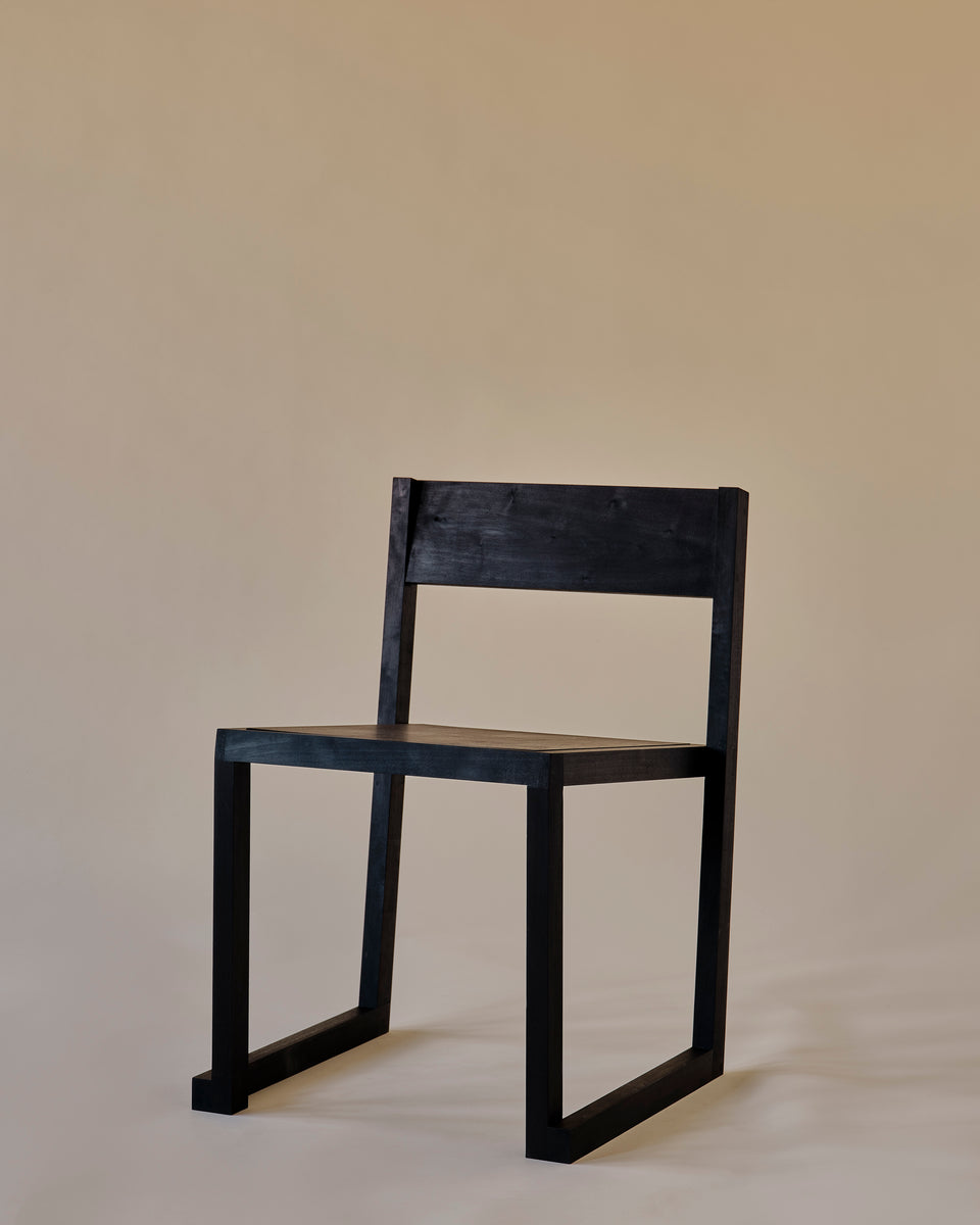 Stacking Chair Ebonized Side 1